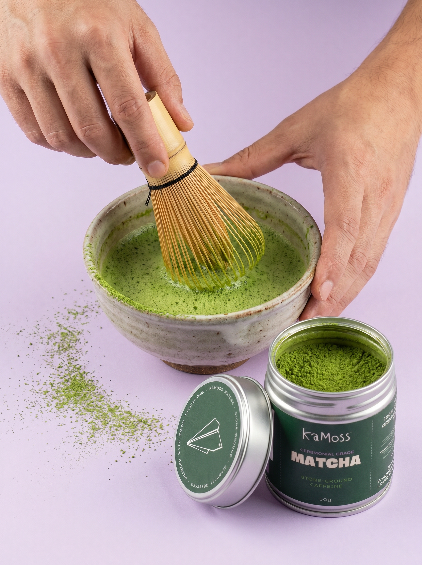 Whisking KaMoss matcha in a bowl beside the tin