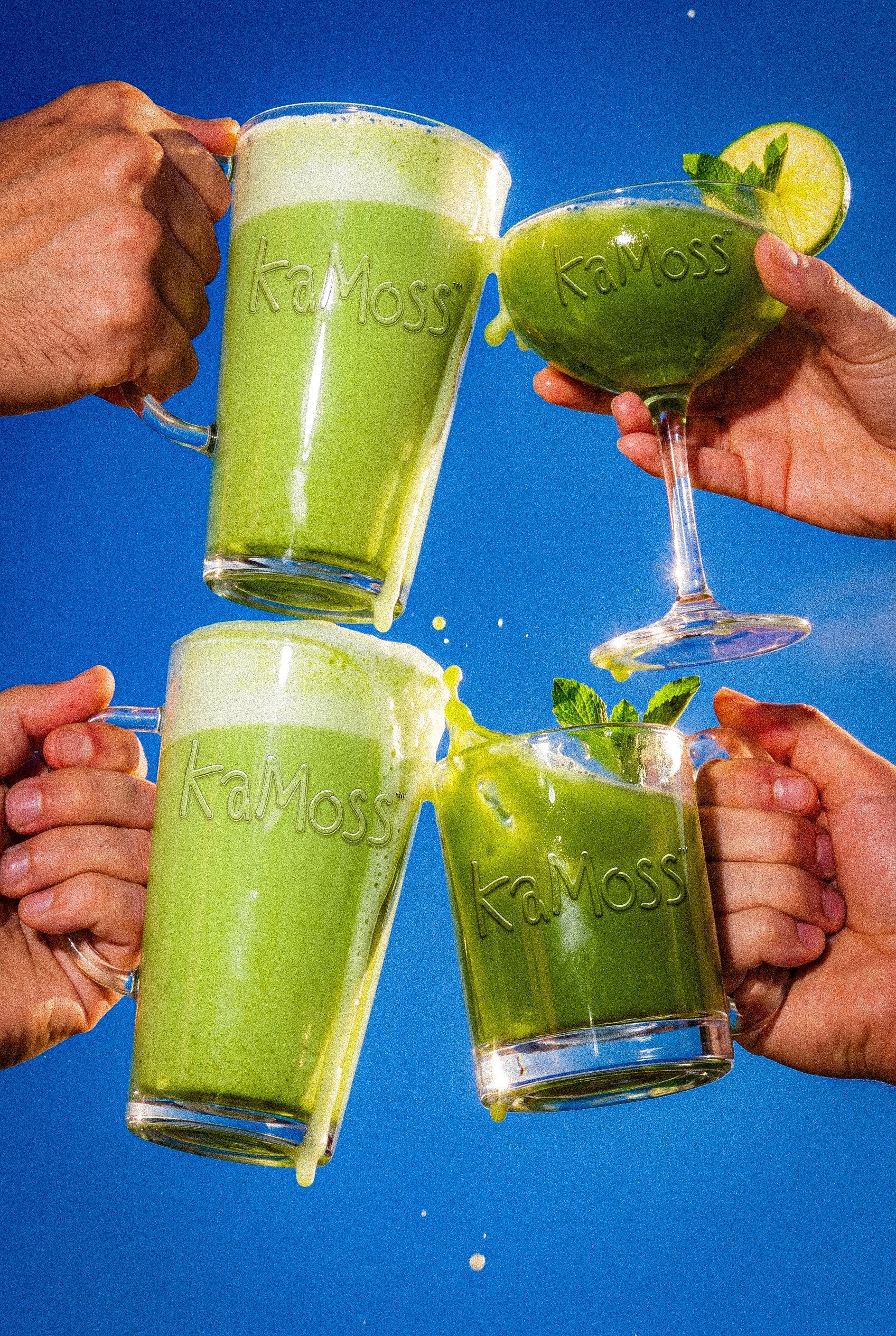 Four KaMoss matcha drinks raised in a cheers